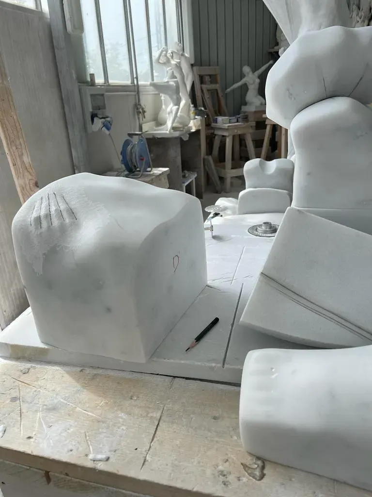 The marble piece being carved
